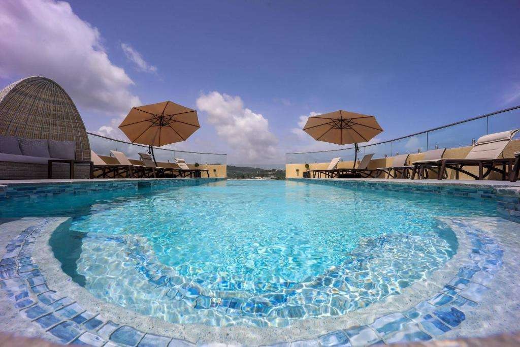 Tobago 2 people, 7 nights Comfort Inn & Suites, breakfast, BA Return Flights LGW, 23kg bags, £604pp. 14 nights £845pp